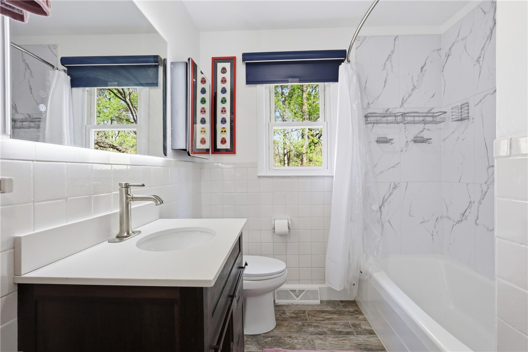 623 West Springwood Drive Seneca, SC 29672 - Photo 16 of 50 Bright and clean, this full bath offers a functional design for daily routines.