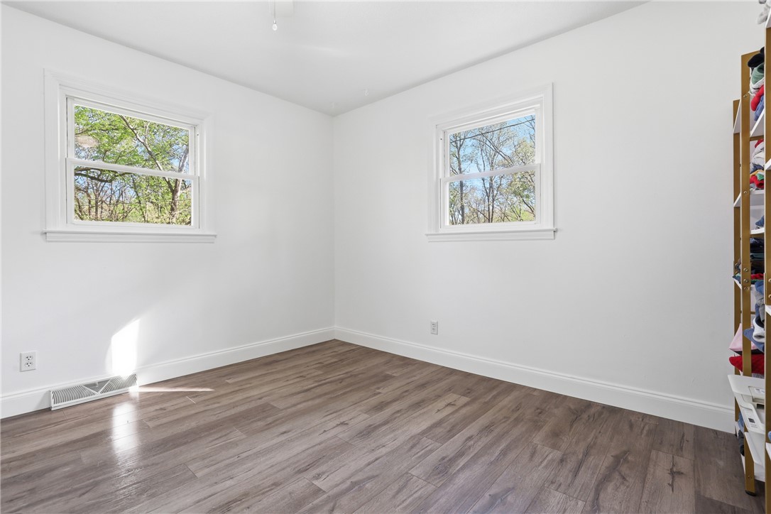 623 West Springwood Drive Seneca, SC 29672 - Photo 17 of 50 This airy room features durable flooring and abundant natural light.