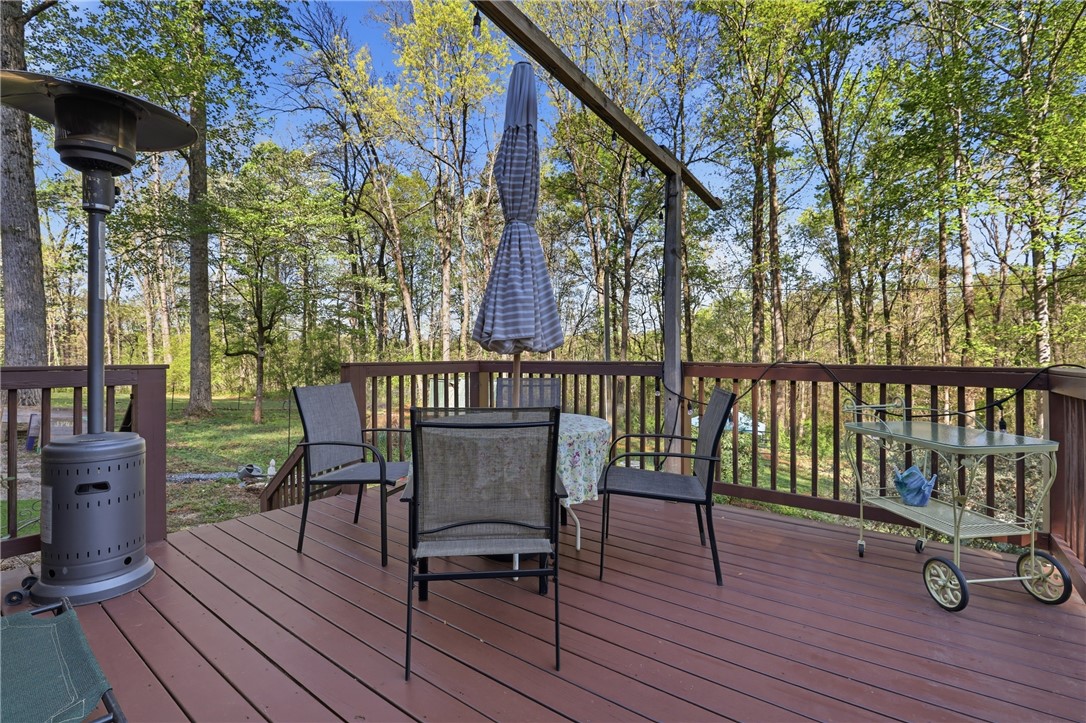 623 West Springwood Drive Seneca, SC 29672 - Photo 23 of 50 Enjoy outdoor living on this expansive deck, perfect for entertaining or quiet relaxation.