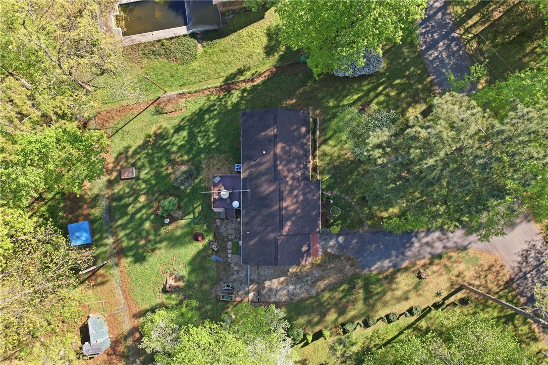 623 West Springwood Drive Seneca, SC 29672 - Photo 30 of 50 An aerial view showcases a residential property nestled amidst lush greenery and mature trees.