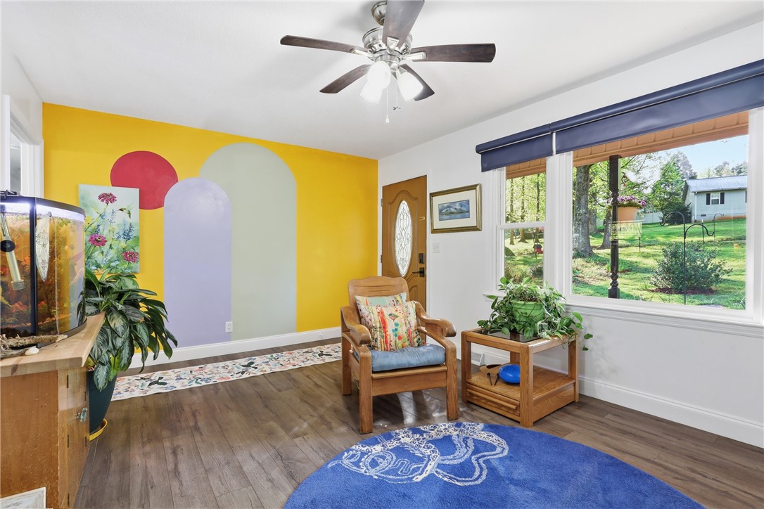 623 West Springwood Drive Seneca, SC 29672 - Photo 3 of 50 This inviting space features durable flooring and abundant natural light.