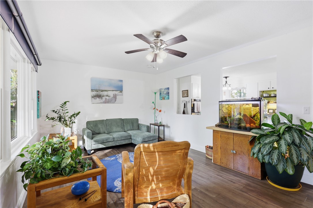 623 West Springwood Drive Seneca, SC 29672 - Photo 37 of 50 This living area features ample natural light and a clear view into the adjacent kitchen space.