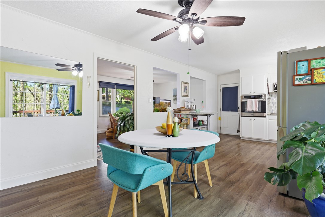 623 West Springwood Drive Seneca, SC 29672 - Photo 7 of 50 This bright kitchen features durable flooring and an open flow to other living areas.