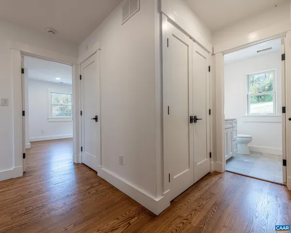 a bathroom with a shower and toilet