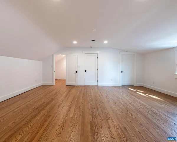 a view of a house with a yard patio and fire pit