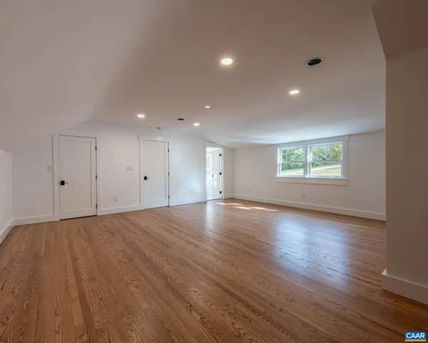a front view of a house with a yard table and chairs