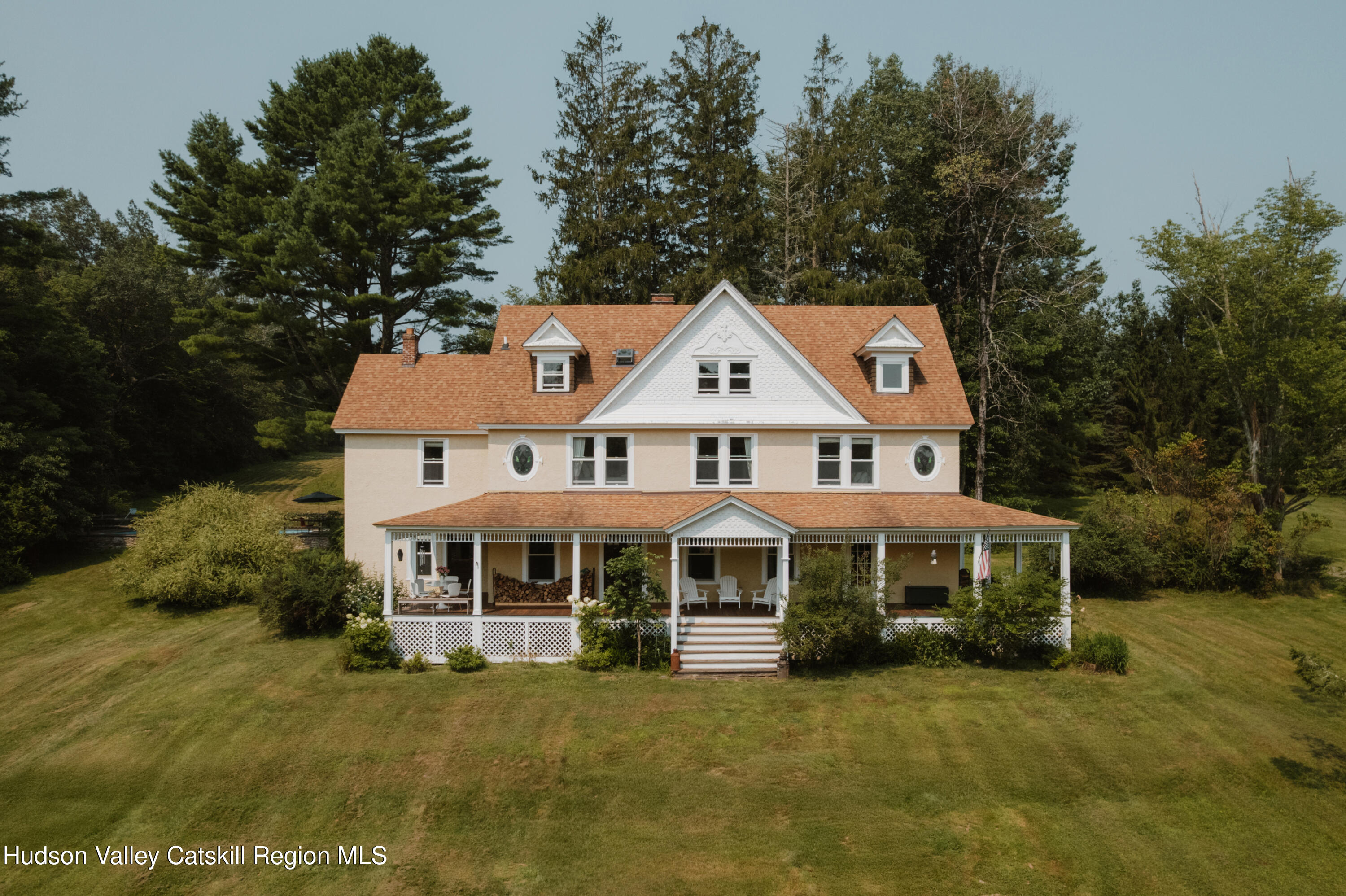 91 Old Hankins Road Callicoon, NY 12723 - Photo 1 of 41 a front view of a house with a garden