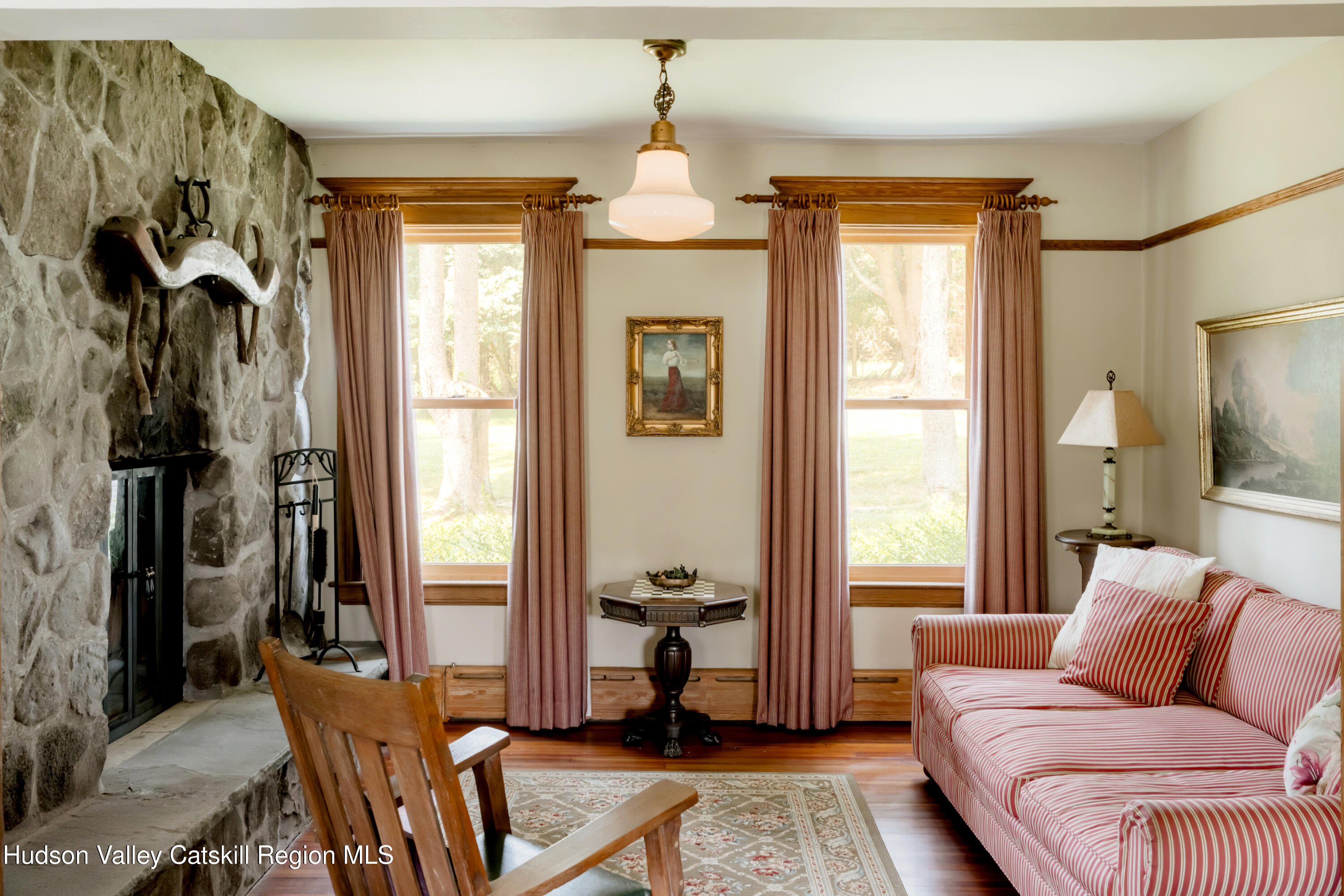 91 Old Hankins Road Callicoon, NY 12723 - Photo 18 of 41 a living room with furniture and a chandelier