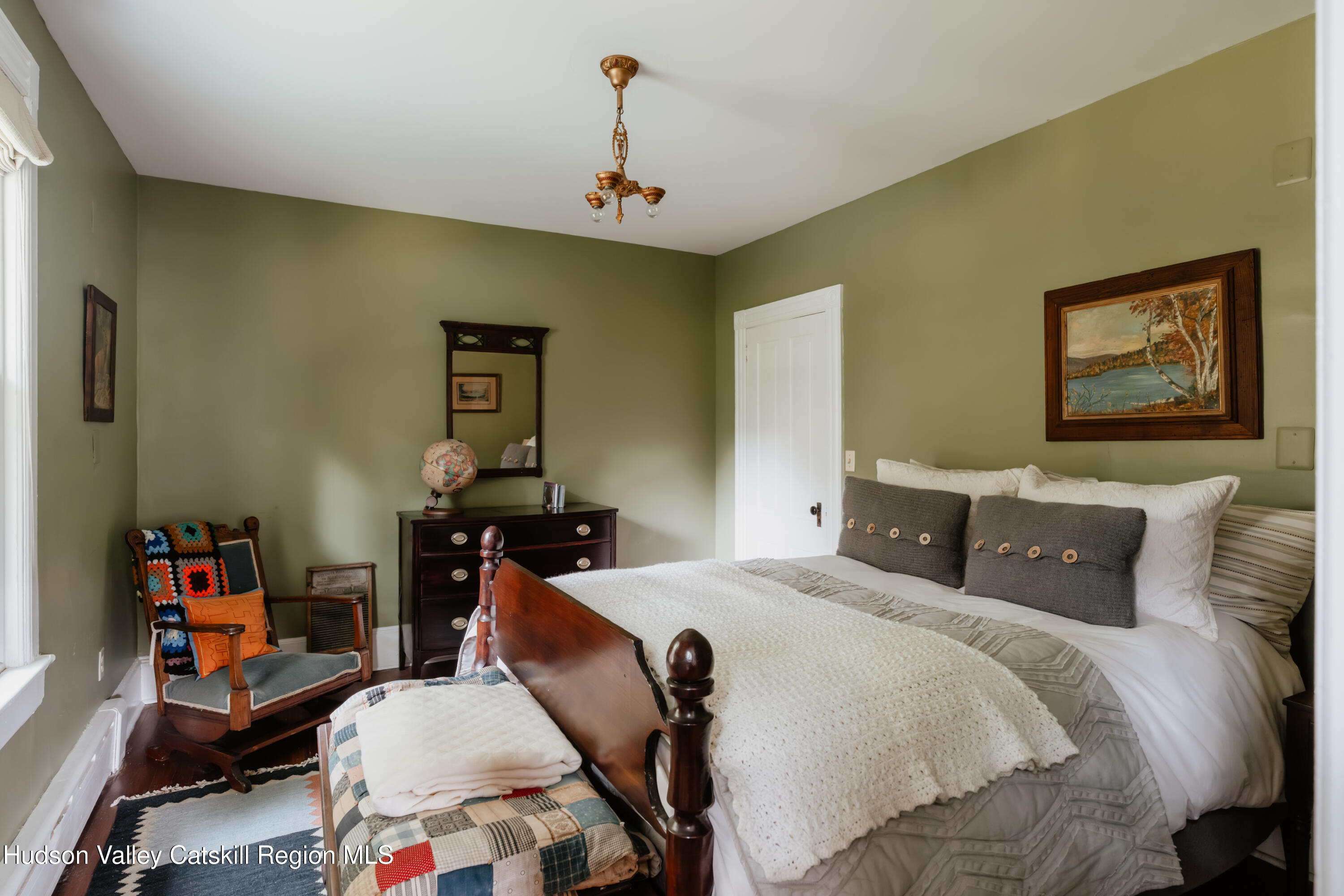 91 Old Hankins Road Callicoon, NY 12723 - Photo 29 of 41 a bedroom with a bed and wooden floor
