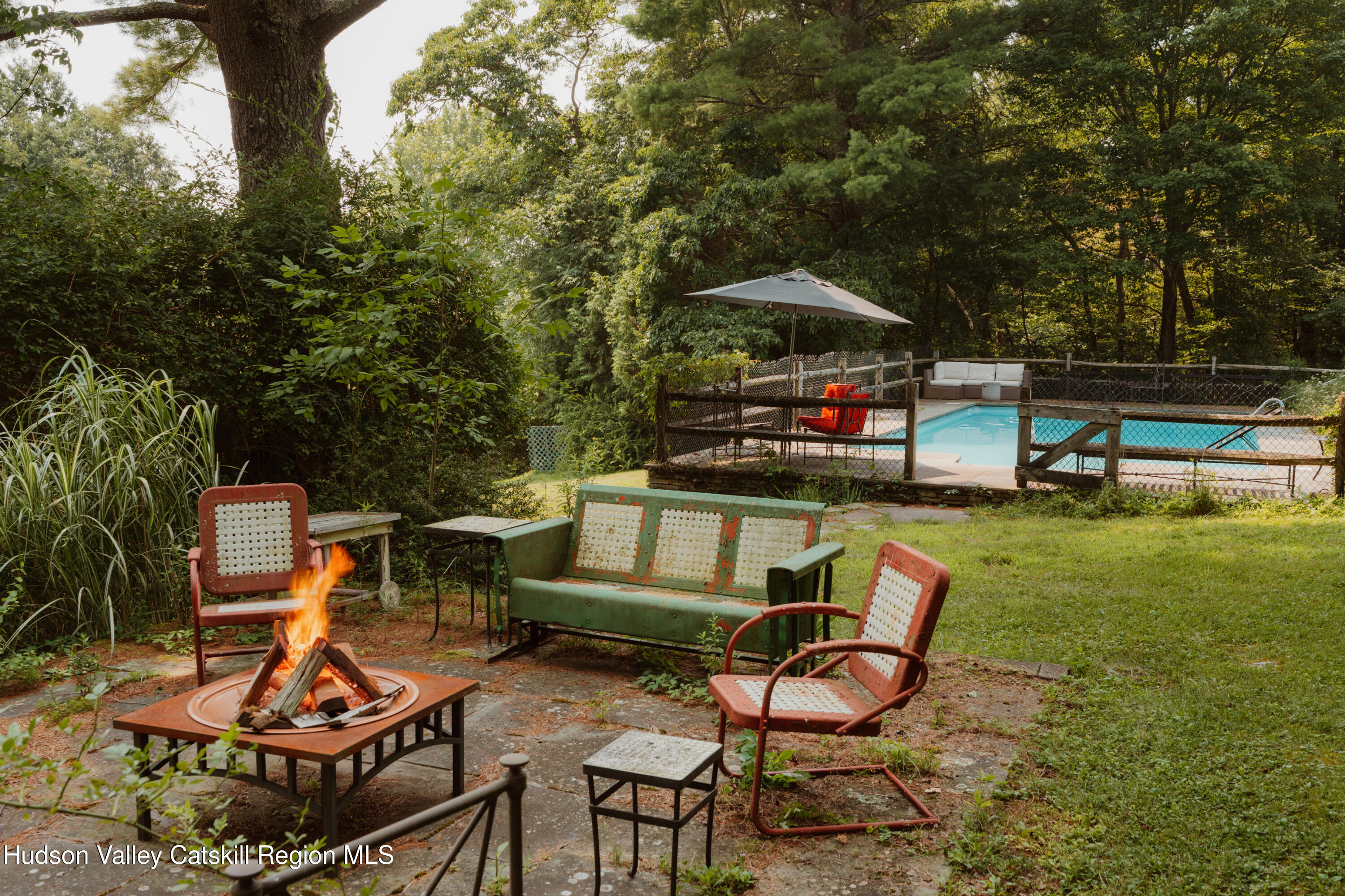 91 Old Hankins Road Callicoon, NY 12723 - Photo 3 of 41 a view of a backyard with sitting area