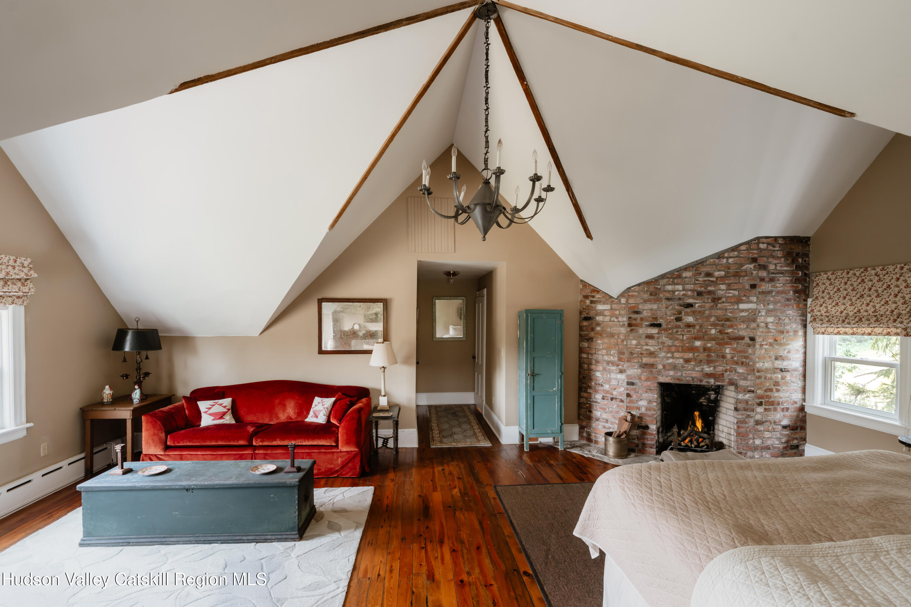 91 Old Hankins Road Callicoon, NY 12723 - Photo 35 of 41 a living room with furniture a fireplace and window