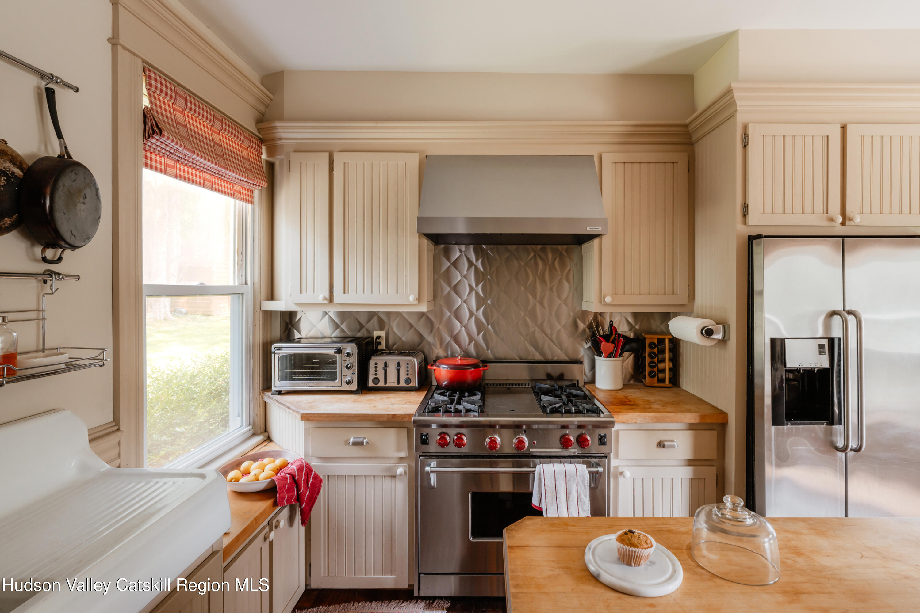 91 Old Hankins Road Callicoon, NY 12723 - Photo 9 of 41 a kitchen with stainless steel appliances granite countertop a stove and a sink