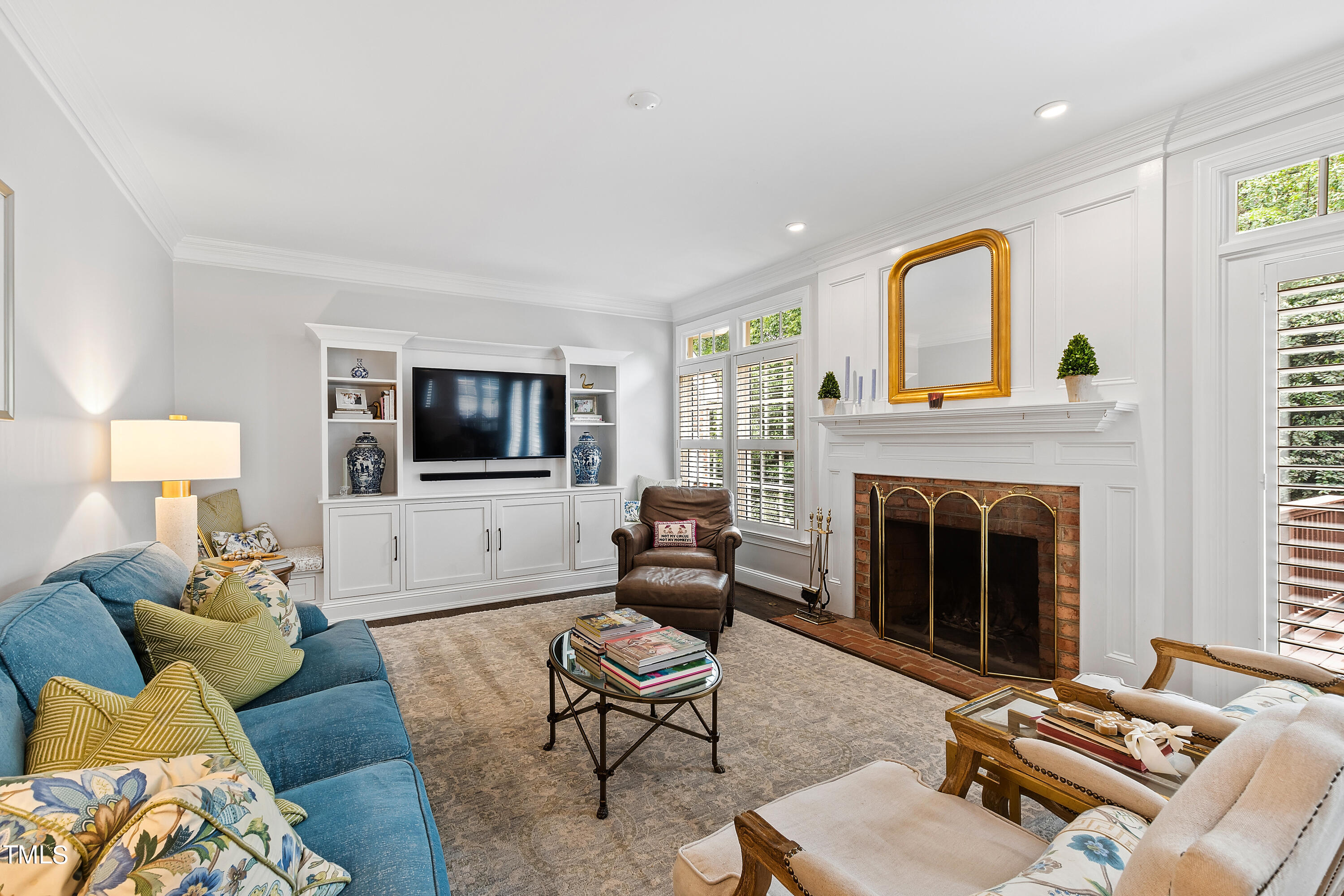 1205 Ballyhask Place Raleigh, NC 27607 - Photo 17 of 53 a living room with furniture fireplace and window
