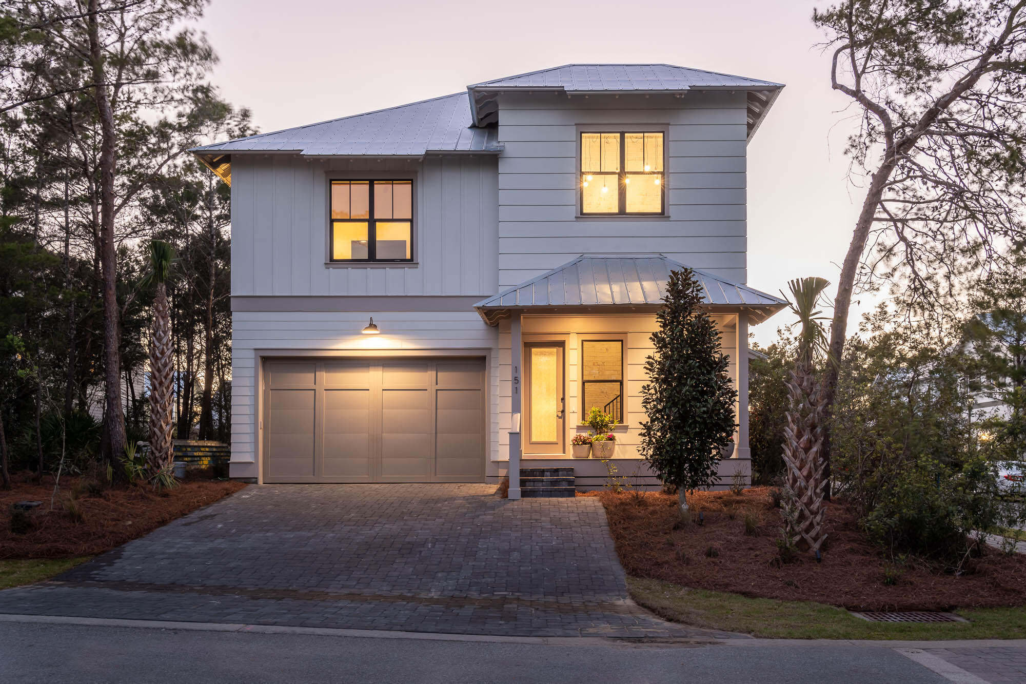 a front view of a house with yard