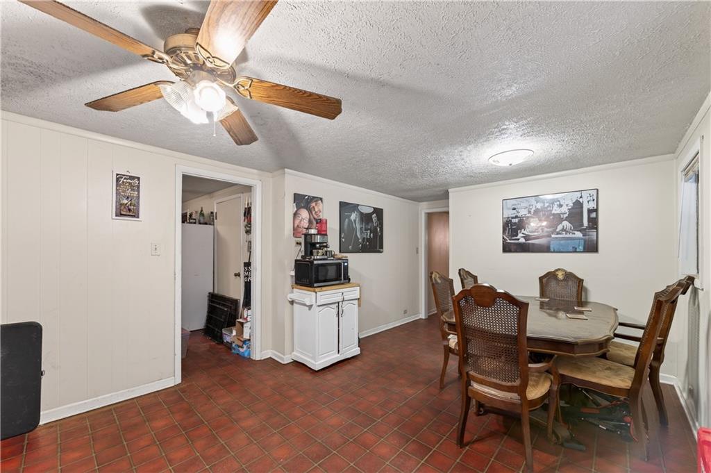 4399 Highway 411 Rydal, GA 30171 - Photo 5 of 37 a view of a dining room with furniture and chandelier
