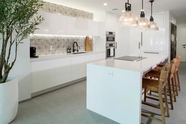 a view of a kitchen with furniture and window