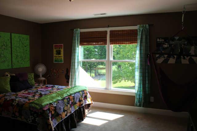 6871 Choctaw Road College Grove, TN 37046 - Photo 18 of 20 One of two bedrooms upstairs. Bedrooms have their own 1/2 bathroom and share the shower/tub area.