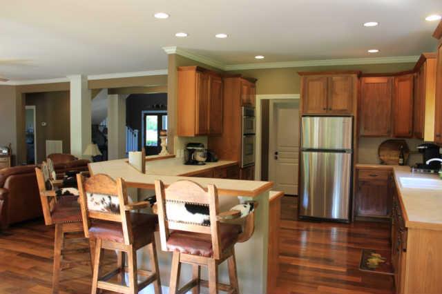 6871 Choctaw Road College Grove, TN 37046 - Photo 8 of 20 Nice & easy workable kitchen with beautiful walnut cabinets, new refrigerator, oven and microwave.