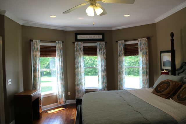 6871 Choctaw Road College Grove, TN 37046 - Photo 9 of 20 Master bedroom with lots of light and a door that takes you to the back porch.