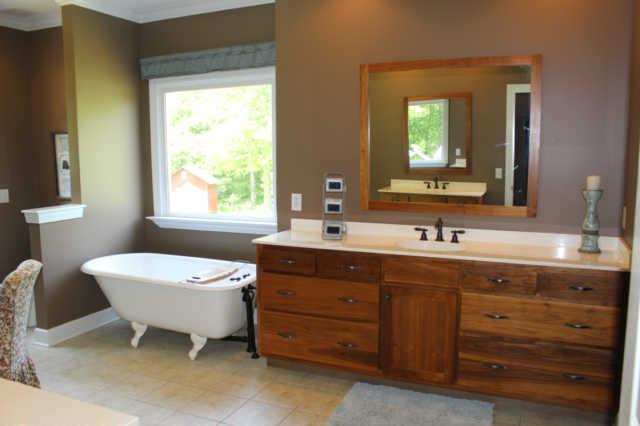 6871 Choctaw Road College Grove, TN 37046 - Photo 10 of 20 Beautiful, large master bathroom with an extra, extra large closet. Lots of light & more custom cabinets.
