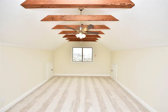 a view of a small space with a fan