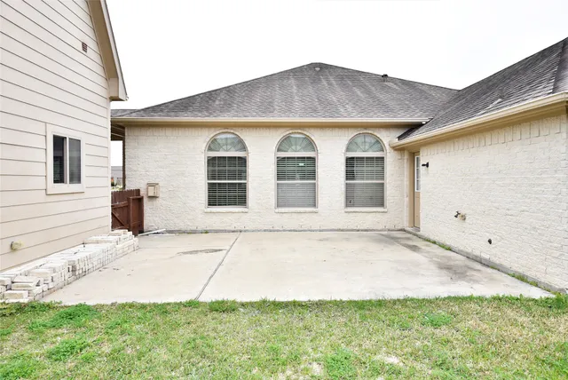 a backyard of a house with lots of green space