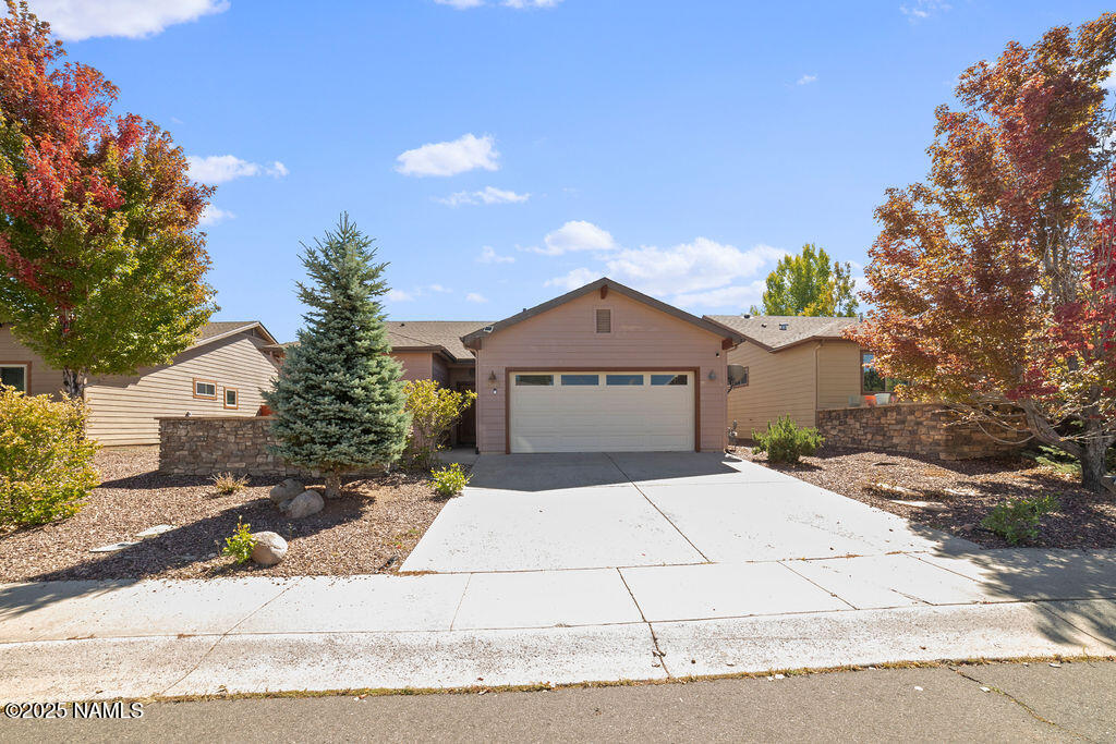 603 Brookline Loop Williams, AZ 86046 - Photo 2 of 57 a front view of a house with a yard