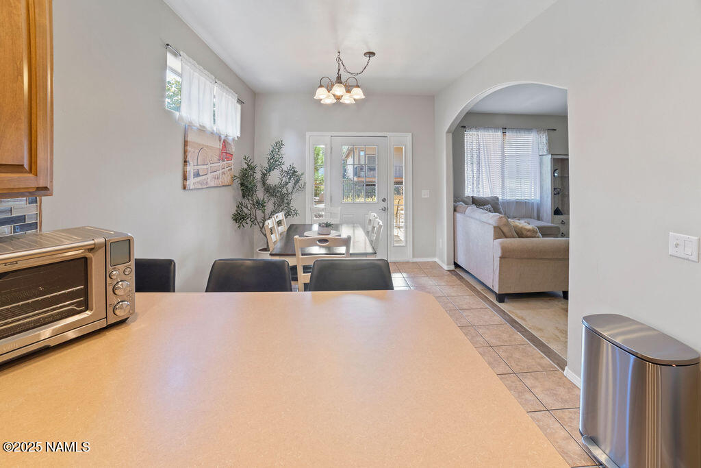 603 Brookline Loop Williams, AZ 86046 - Photo 29 of 57 a living room with furniture and a fireplace