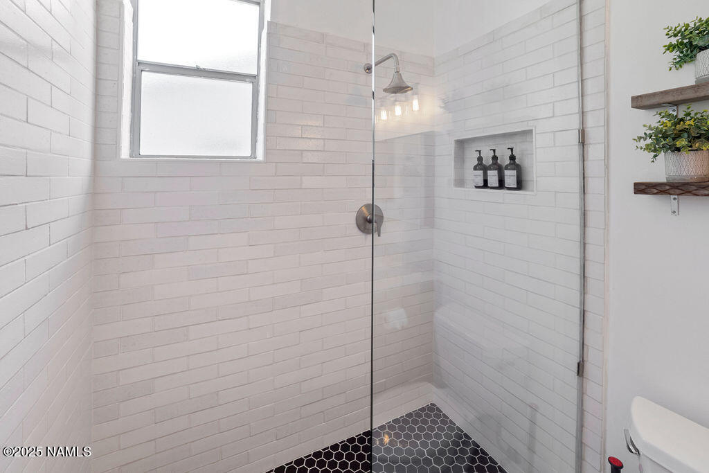 603 Brookline Loop Williams, AZ 86046 - Photo 32 of 57 a bathroom with a shower