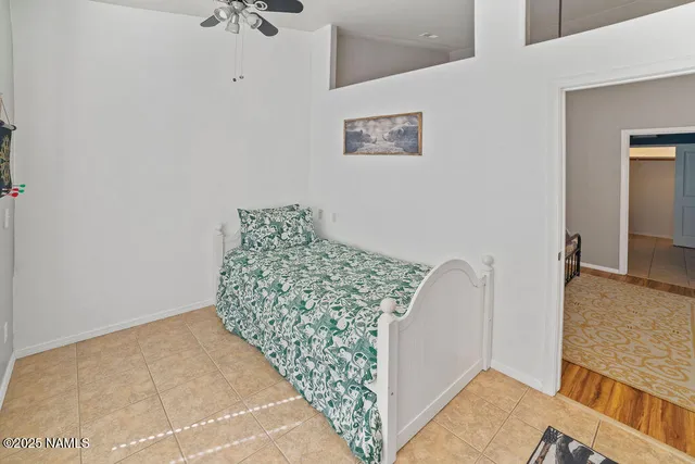 a view of a backyard with a patio and outdoor seating