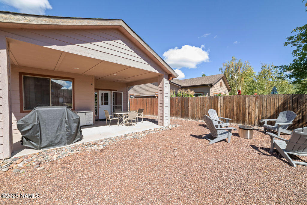603 Brookline Loop Williams, AZ 86046 - Photo 55 of 57 a view of a backyard with a patio and outdoor seating
