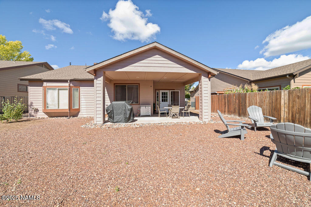 603 Brookline Loop Williams, AZ 86046 - Photo 56 of 57 a view of a house with backyard and sitting area