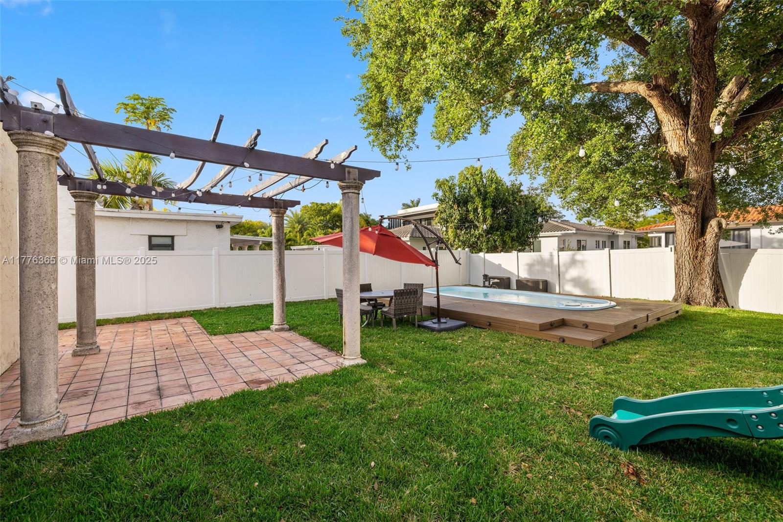 411 Southwest 22nd Road Miami, FL 33129 - Photo 20 of 25 a view of backyard with a garden