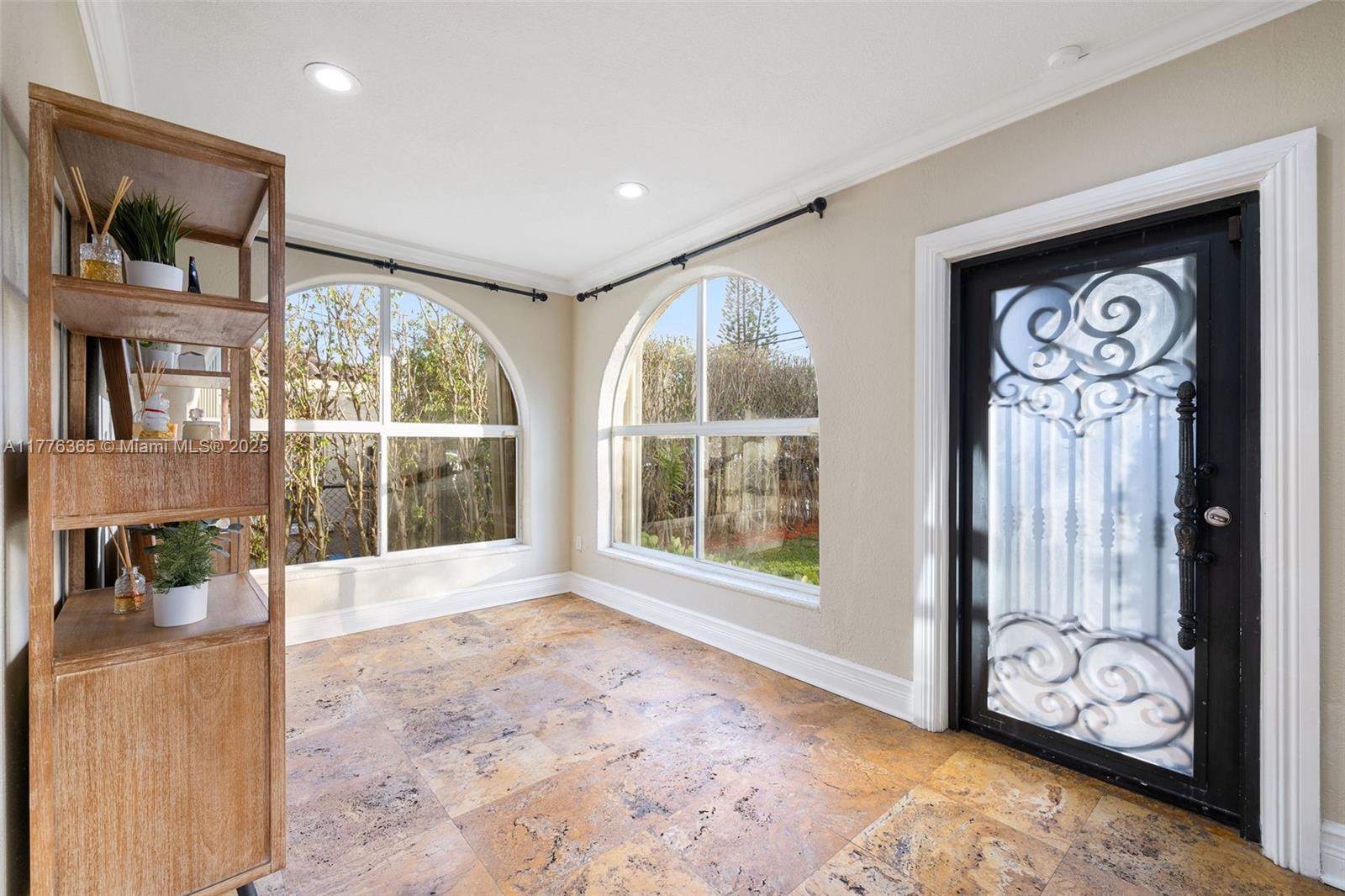 411 Southwest 22nd Road Miami, FL 33129 - Photo 4 of 25 a view of livingroom with furniture and front door