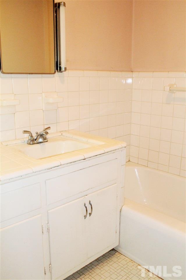 2624 Winton Road Durham, NC 27707 - Photo 16 of 25 Ceramic tile, tub and separate shower