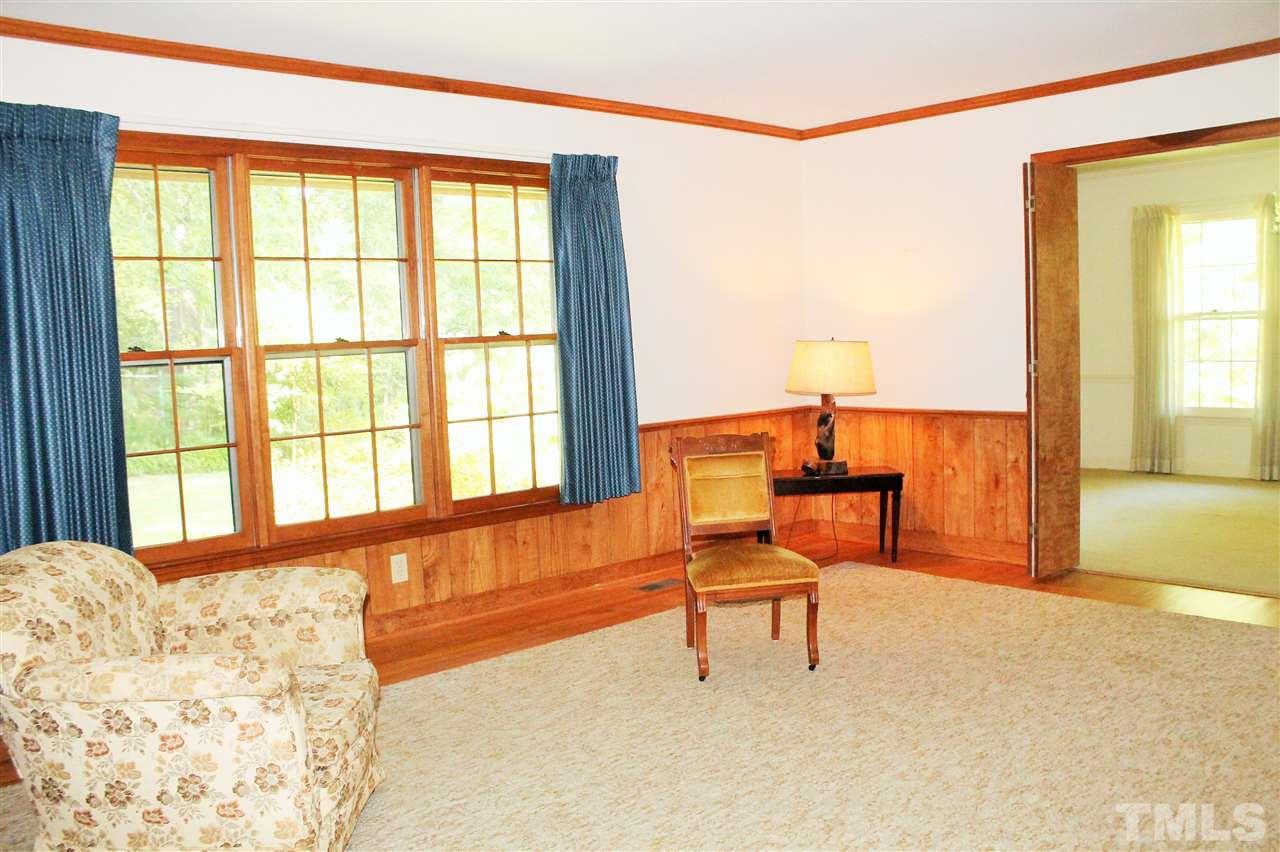 2624 Winton Road Durham, NC 27707 - Photo 9 of 25 The Family Room connects to the Dining Room but can be closed with folding doors for privacy.