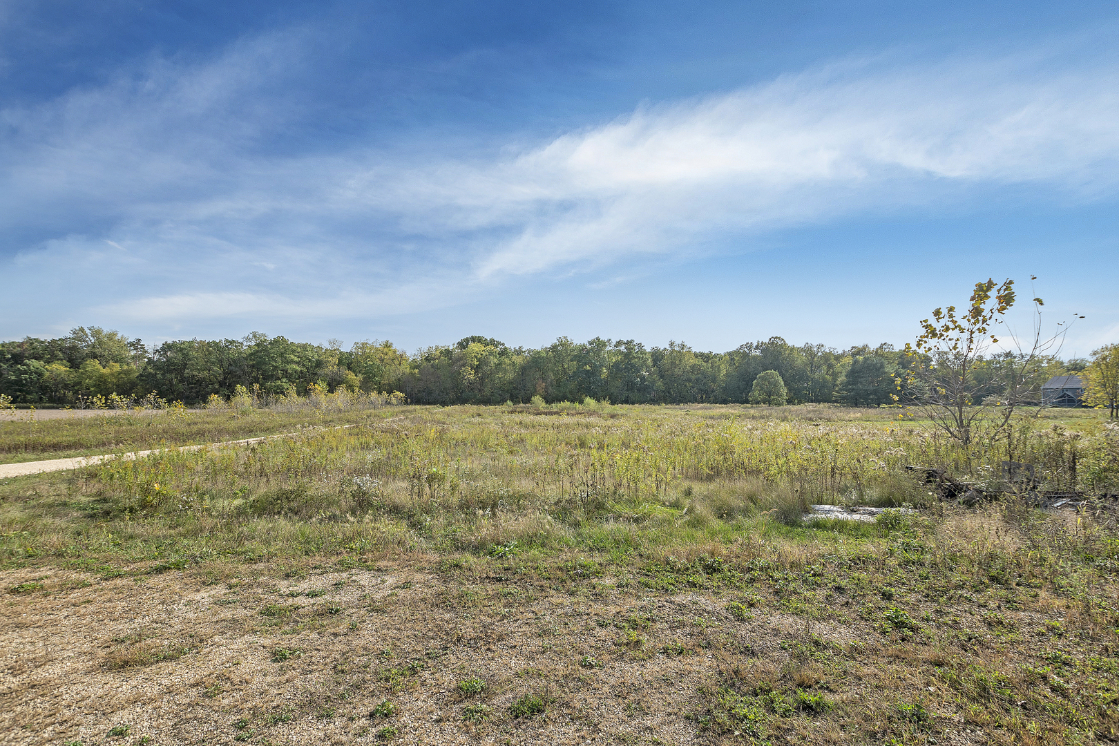 32804 Pleasant Hill Road Genoa, IL 60135 - Photo 3 of 19 a view of lake with mountain in the back