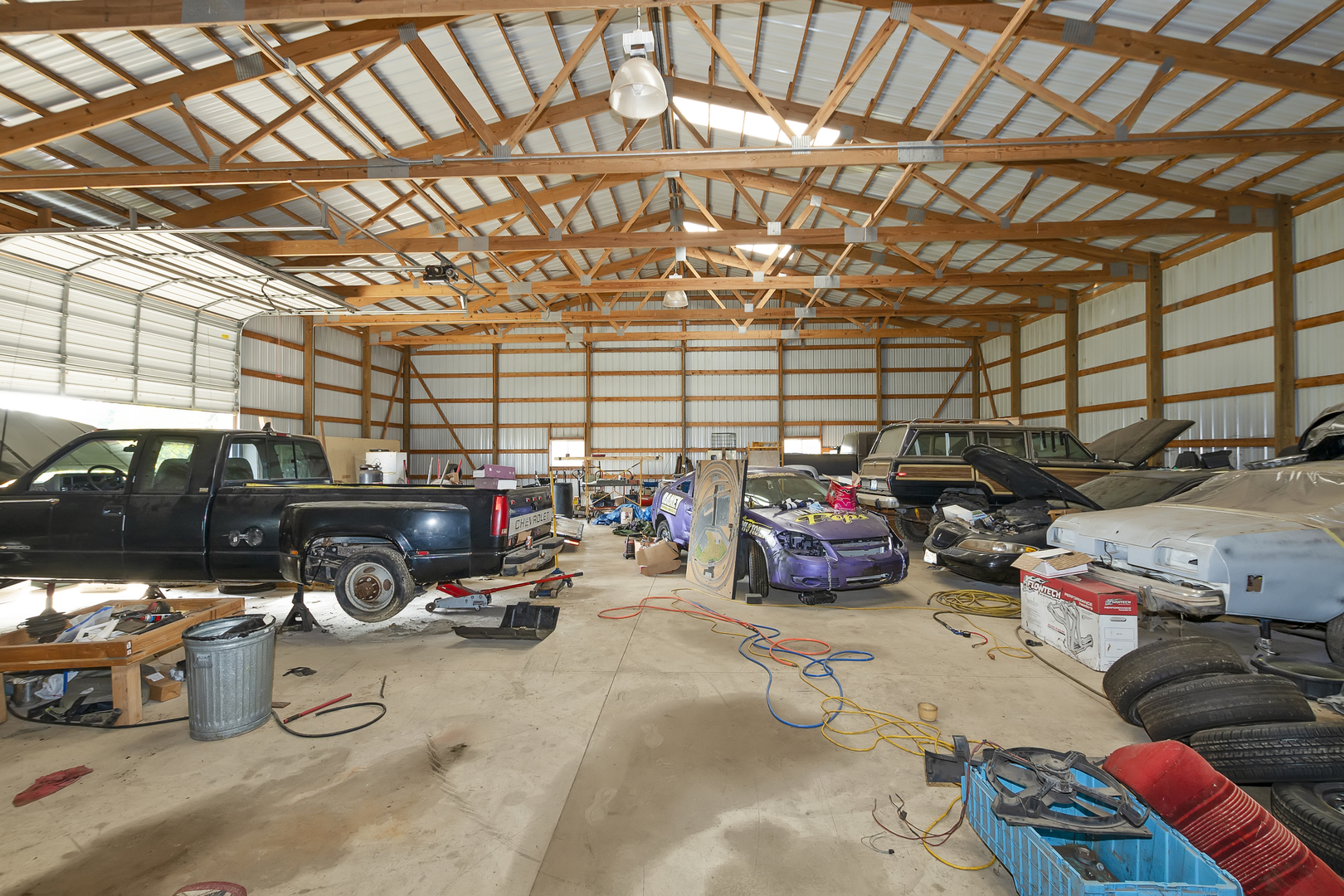 32804 Pleasant Hill Road Genoa, IL 60135 - Photo 7 of 19 a view of parking garage with cars