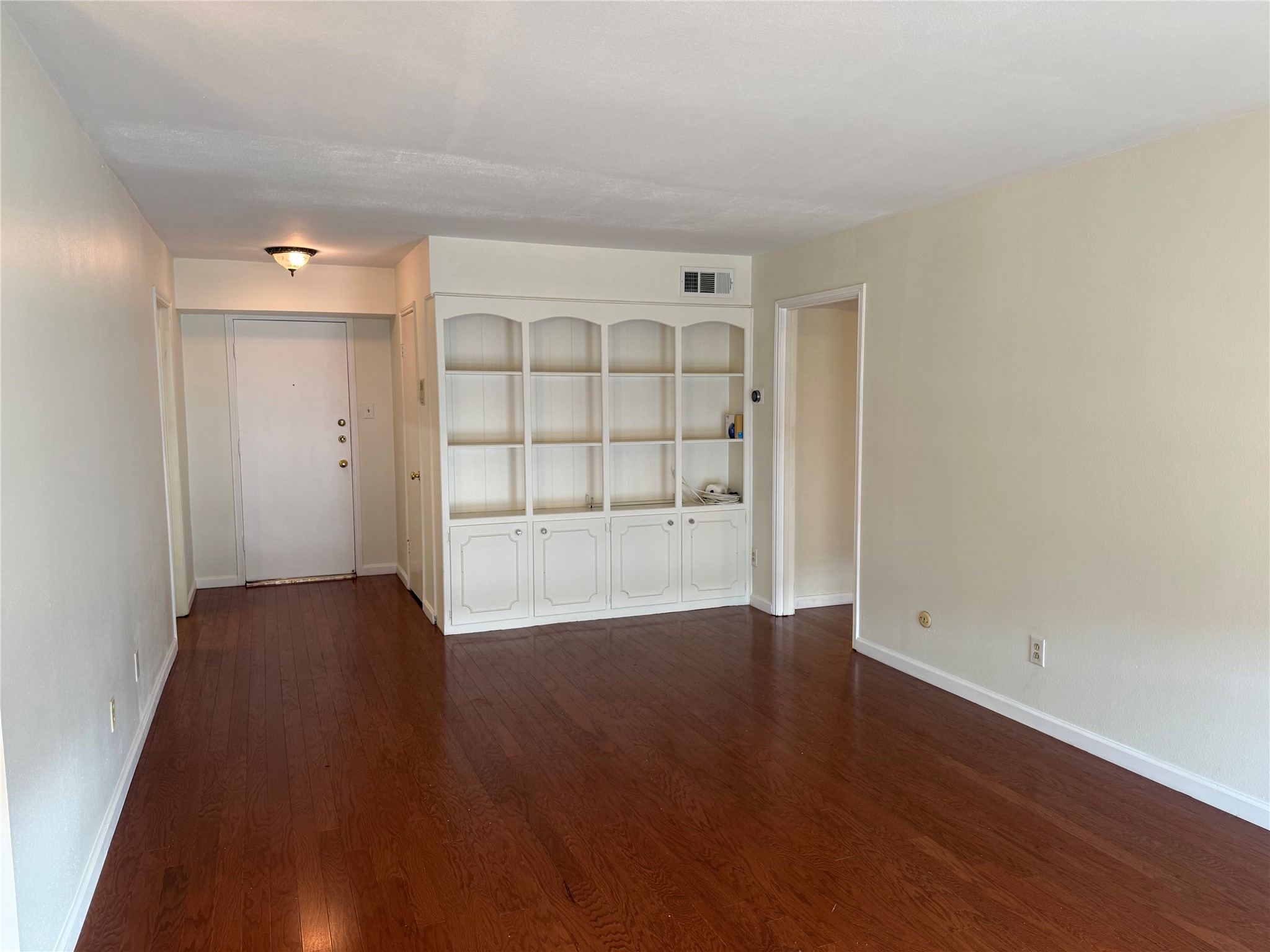 357 North Post Oak Lane, Unit 207 Houston, TX 77024 - Photo 18 of 25 wooden floor in an empty room