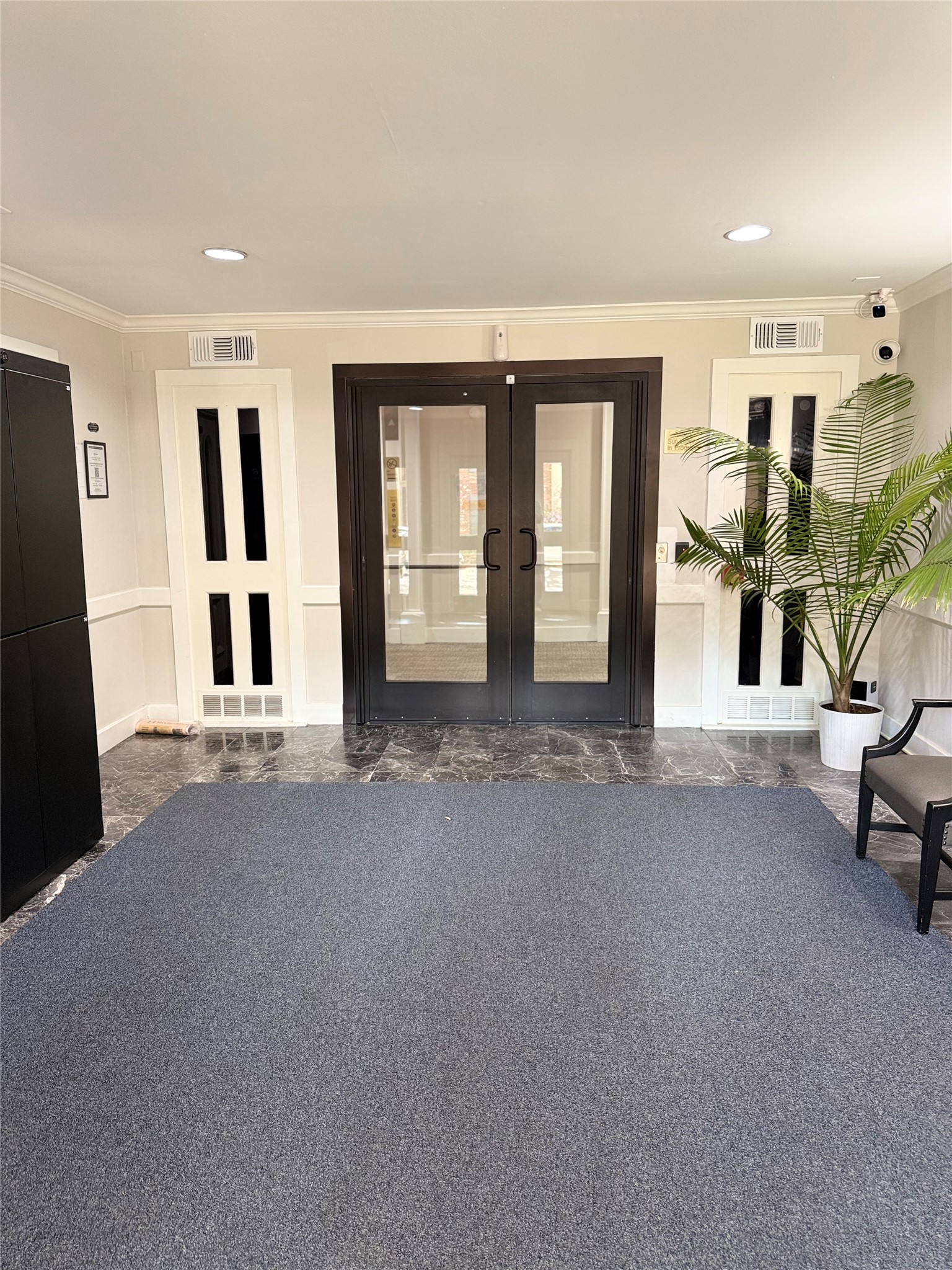 357 North Post Oak Lane, Unit 207 Houston, TX 77024 - Photo 10 of 25 a view of livingroom with furniture and windows