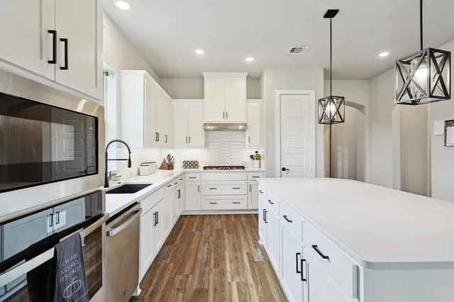 a living room with furniture fireplace and flat screen tv