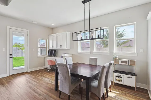 a workspace with furniture and window