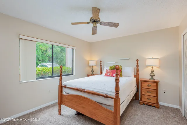 a bathroom with a sink toilet and a mirror