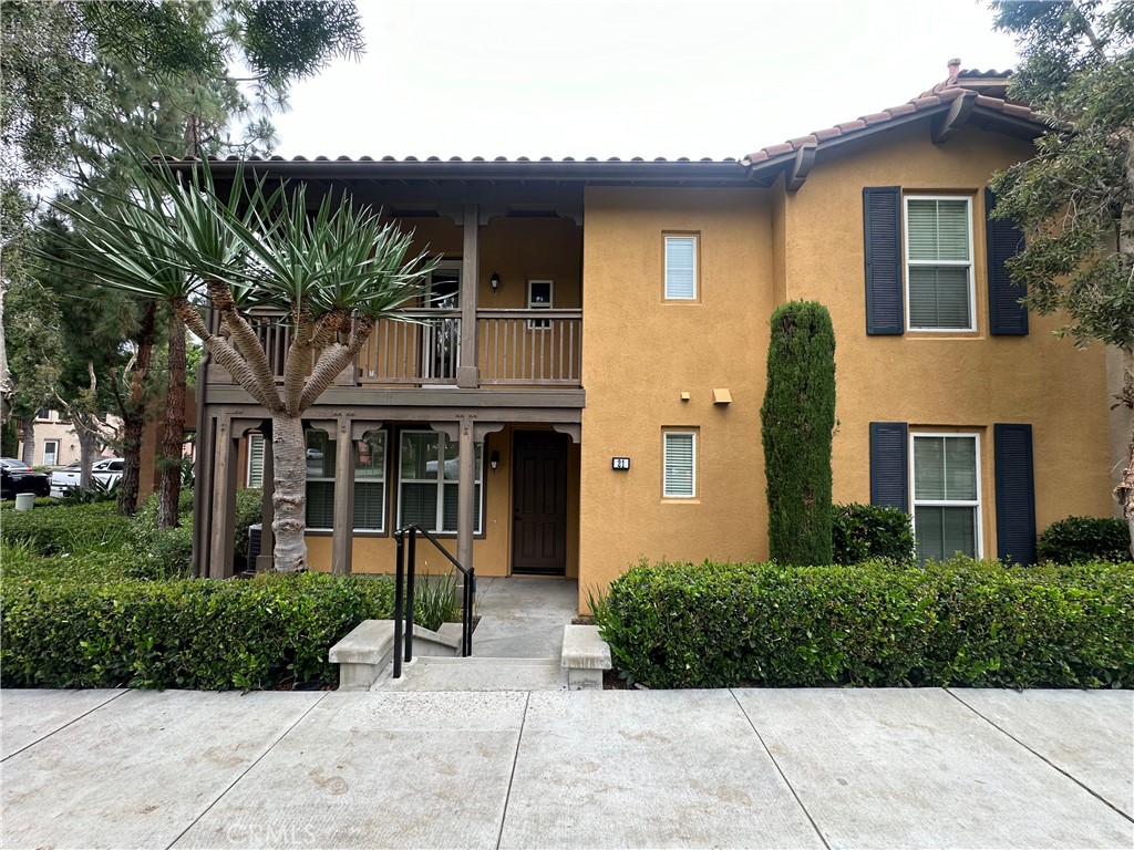 21 Nightshade Irvine, CA 92603 - Photo 1 of 1 a front view of a house with a garden