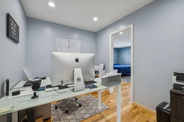 a view of a kitchen with a sink and living room