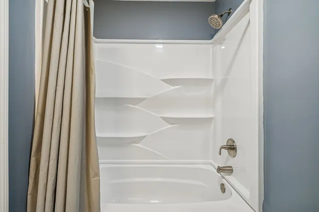 a view of front door and bedroom