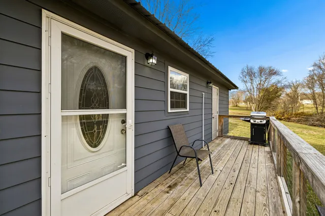 a backyard of house with trees