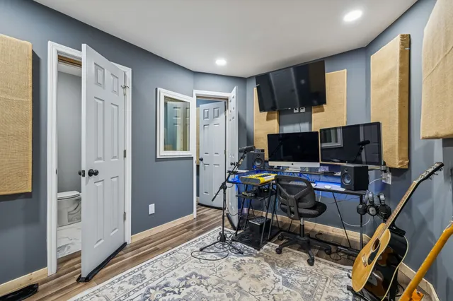 a view of a hallway with workspace