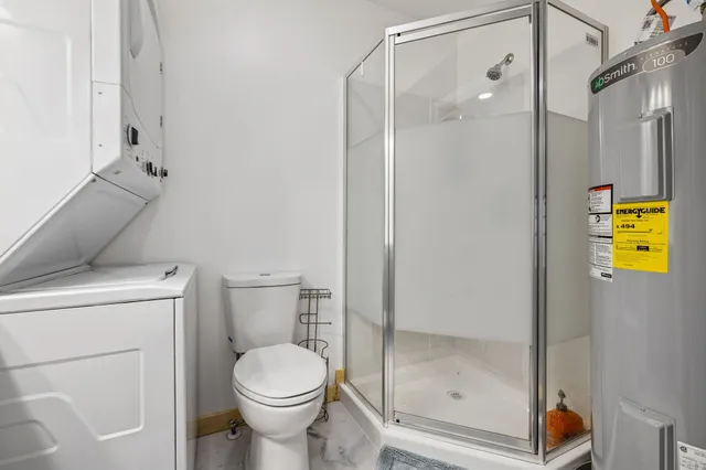 a view of balcony with wooden floor and fence