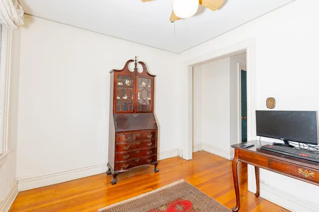a workspace with furniture and window
